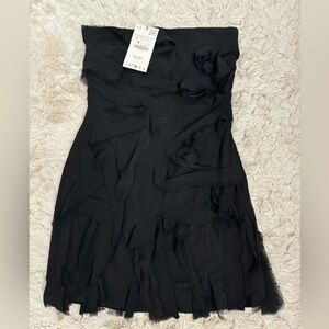 New with tags! Zara mini dress with ruffles in black.